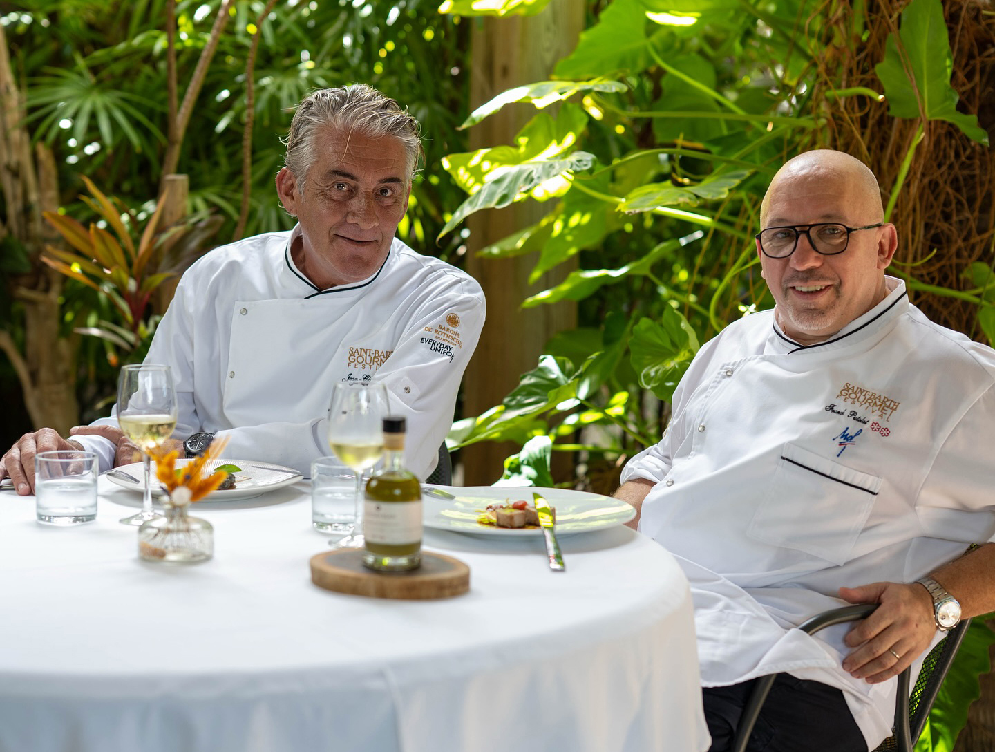 Guest chefs at a table during the St. Barth Gourmet Festival, St. Barts